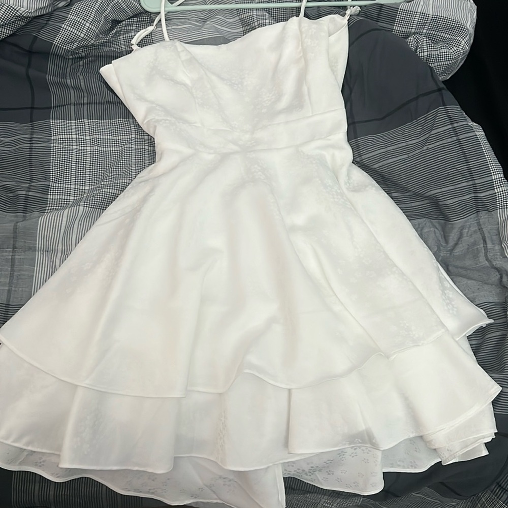 Brand: lillyful color: white dress type all white with backless tied with a bow